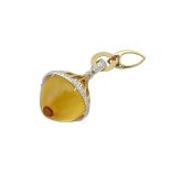 ITALIAN 18K YELLOW AND WHITE GOLD PENDANTsuspending a large circular citrine cabochon and