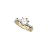 14K YELLOW GOLD RINGset with a brilliant cut diamond (approx. 1.45ct.) flanked by 2 small baguette