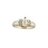 14K YELLOW GOLD RINGset with a fancy yellow marquis cut diamond (approx. 0.89ct.) flanked by 6