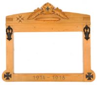 A German pine memorial frame, the top with relief representation of an airship and foliate spray