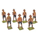 A rare set of Britains Boy Scouts. 7 examples with dark blue shorts, khaki shirts and caps. Each