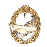 A scarce Third Reich E Boat badge second pattern,  gilded wreath with silvered E Boat and reverse,