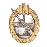 A Third Reich badge for Coastal Artillery, bi-metal finish, maker’s mark “DH”. GC Plate 12