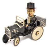 A scarce MARX tinplate clockwork character toy ‘Charlie McCarthy’ and car. A  1920’s style open