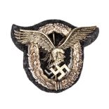 A Third Reich Luftwaffe Pilot’s badge, silvered finish, early production, maker’s mark on reverse “