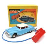 A Marx battery operated plastic ‘Electric Car’. An early 1950s sedan, in blue with white roof and