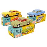 3 Corgi Toys. Aston Martin DB4 (218). An example in yellow with red interior and ‘cast spoked’