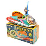 A 1960’s T.M. battery operated tinplate ‘Non-Fall Moon Rocket’. A brightly coloured toy in blue/