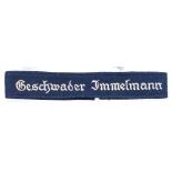 A scarce Third Reich Luftwaffe cuff title of the Geschwader Immelmann, silver grey embroidery on