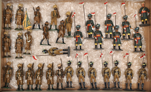 32 white metal soldiers. Indian army. Comprising a Lancer regiment with British Officer and 7 Sowars