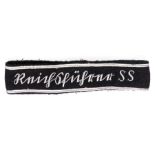 A Third Reich SS cuff title Reichsfuhrer SS, Sturmbrigade,  embroidered in silver wire, officer
