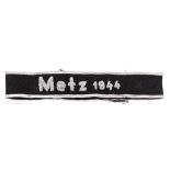 A scarce Third Reich “Metz 1944” cuff title, instituted 24.10.44 for fighting at Metz Citadel 25.7.