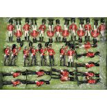 32 white metal soldiers. British army foot guards in scarlet tunics. Comprising – 15 privates from