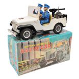 A 1960’s T.N. battery operated Radio car. An American style Jeep 28cm, in white with black