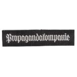 A scarce Third Reich Propagandkompanie cuff title, of silver thread Bevo weave embroidery. VGC