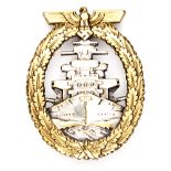 A rare Third Reich High Seas Fleet badge,  gilt eagle and wreath, plated battleship and slightly