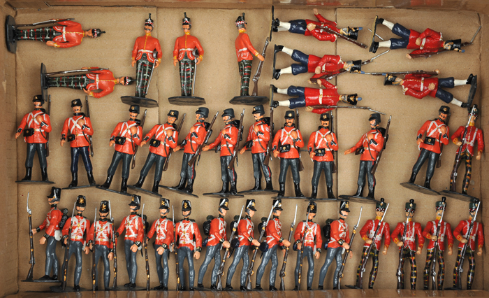 37 white metal soldiers. British infantry in scarlet tunics. Comprising – 11 Waterloo period