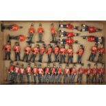 37 white metal soldiers. British infantry in scarlet tunics. Comprising – 11 Waterloo period