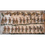 29 white metal soldiers. 23 Gordon Highlanders in Boer War khaki foreign service uniform with