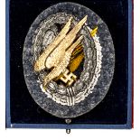 A scarce Third Reich Parachutists badge of late war quality,  grey convex wreath, gilt eagle,