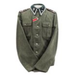 A very scarce Third Reich Waffen SS M36 tunic Oberscharfuhrer or Lehr Abteilung Technisches Fuhrer,