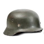 A good Third Reich M35/40 single decal Schutzpolizei steel helmet, field grey painted skull, rim