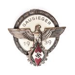A scarce Third Reich state level gausiegers victors badge, for National Trade Competition 1939,