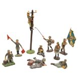 9 Elastolin and Lineol German composition figures. Standard bearer, signaller, soldier climbing
