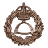 A scarce officer’s bronze cap badge of the 7th Bn The Hampshire Regt.  GC (blades missing). See