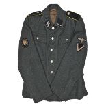 A very rare Third Reich Waffen SS M43 service tunic, of Mountain Troops, to the rank of SS Sturmann,