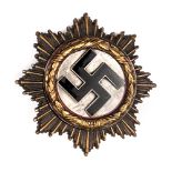 A scarce Third Reich German Cross in gold 1941 type A, with 6 rivets. GC contained in a wooden box