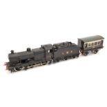 A finescale O gauge electric class 4F 0-6-0 tender locomotive. An example in LMS black livery, RN