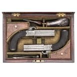 A cased pair of 38 bore double barrelled over and under turnover percussion boxlock pistols, 8”