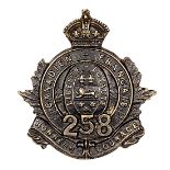 A similar cap badge of the 258th Bn, of non voided blackened brass. Near VGC. Plate 3