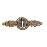 A good quality Third Reich Luftwaffe bomber clasp,  gold finish with WM bomb riveted on, fluted