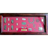 †Anglo-Zulu War, Rorke’s Drift 22.1.79 A framed display of battlefield relics comprising 4 cartridge