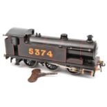 A Bassett-Lowke O gauge clockwork freelance 0-6-0 tank locomotive. An example in red lined black