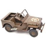 A Tri-ang Toys clockwork tinplate U.S. Army Jeep. WW11 style in matt olive green with U.S. star