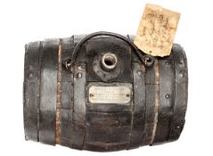 An iron bound darkwood water cask, with iron top spout and carrying handle, silver plate engraved “