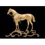 A very fine gilt metal plaque of Wellington’s horse Copenhagen, approx 10” x 12”, set on a black