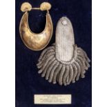 A boxed and glazed gorget and epaulette belonging to Leiutenant James Murray 20th Regiment, together