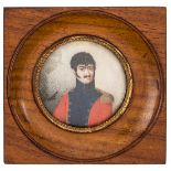 A circular miniature painting on ivory of a Napoleonic period Dutch Lancer of the Guard, half