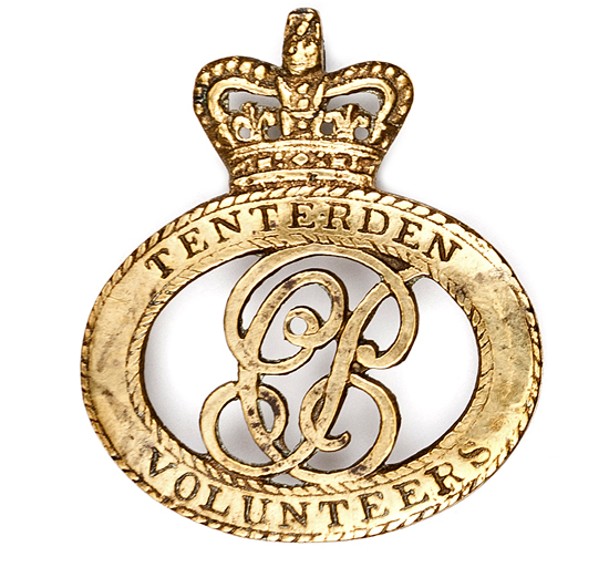 A set of 3 cast brass badges of the Tenterden Volunteers, a crescent shaped cap badge inscribed “