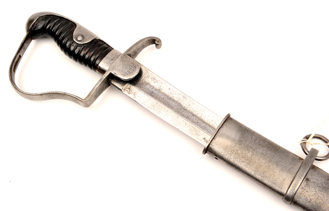 A German 1811 pattern cavalry trooper’s sword, blade 31½”, with leather bound grip, in its steel