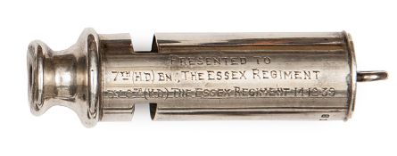 A presentation silver whistle, engraved “Presented to 7th (HD) Bn The Essex Regiment by 6th (VB) The