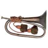 A brass and copper bugle from Waterloo, green and red cords and tassels, maker’s name “Wigley 204