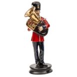 A hand painted Sutty figure of a Bandsman, Royal Fusiliers, in full dress with tuba, 12”, VGC