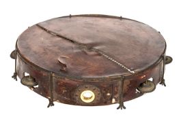 A most interesting Georgian bandsman’s painted tambourine, the 3” deep outer frame, incorporating