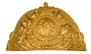 An officer’s gilt bearskin plate of the Grenadier Guards, bearing curved 1816-37 Royal Arms with