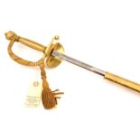 A George VI courtsword, etched blade 32” by Wilkinson Sword, the beaded gilt brass hilt with bullion